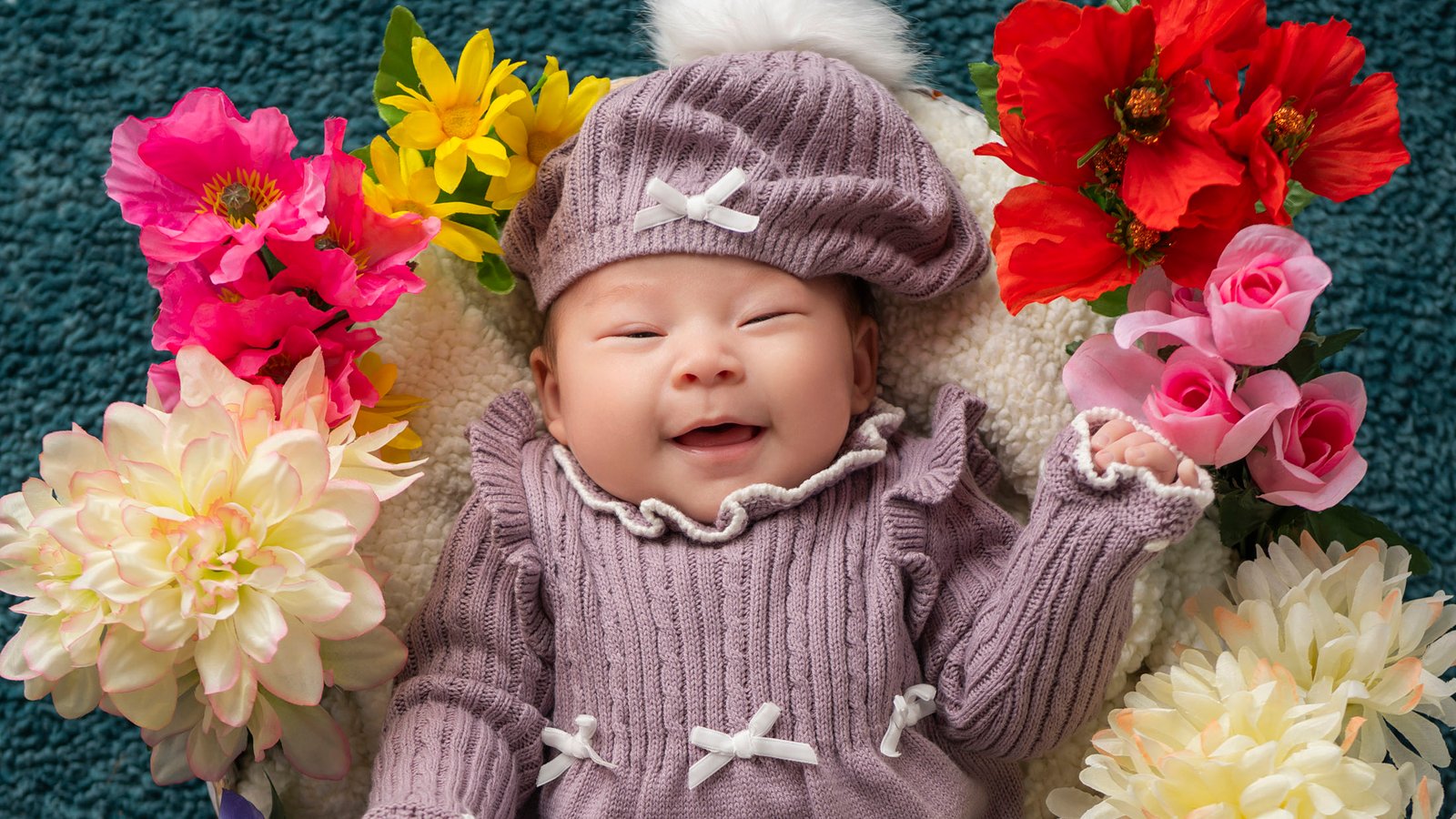 Newborn Asian Baby Smiling