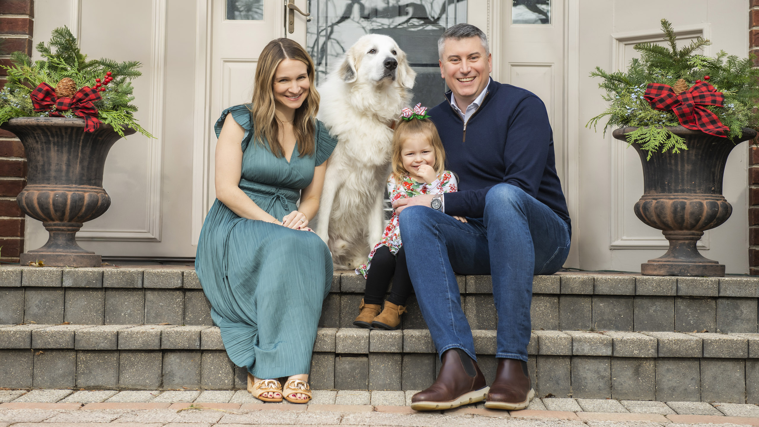 Family portrait outside their home