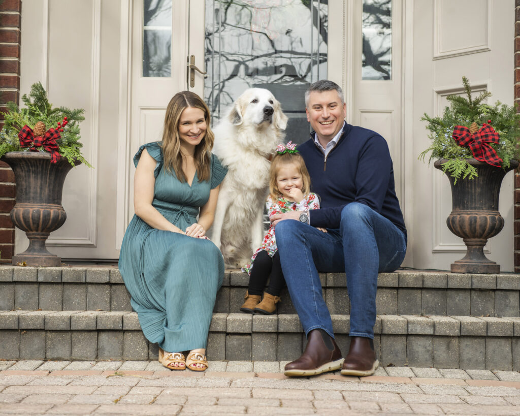 Family portrait outside their home